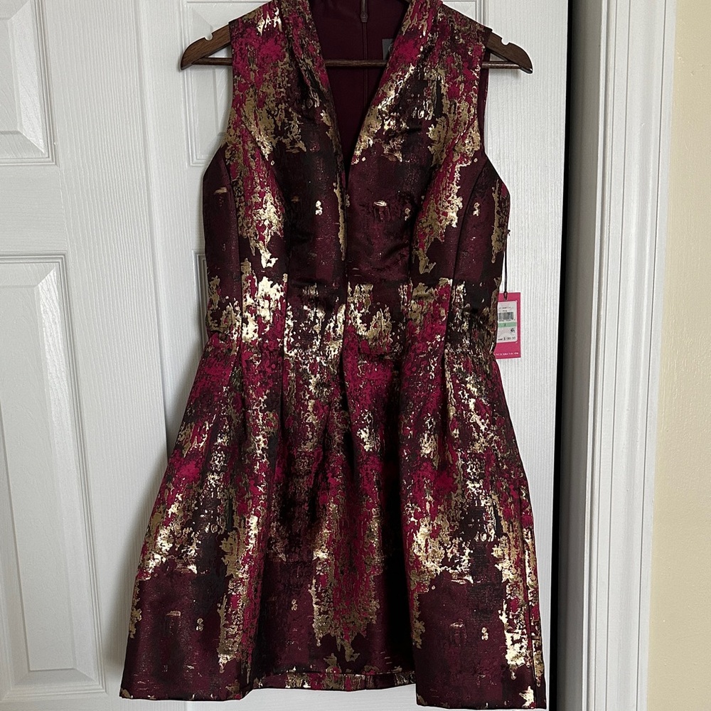 Elegant Maroon and Gold Cocktail dress